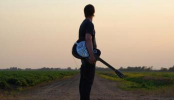 David Blandy with guitar
