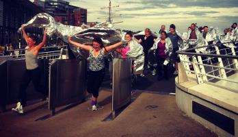 Volunteer performers rehearse on the Quayside